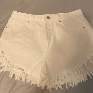 White cut off shorts